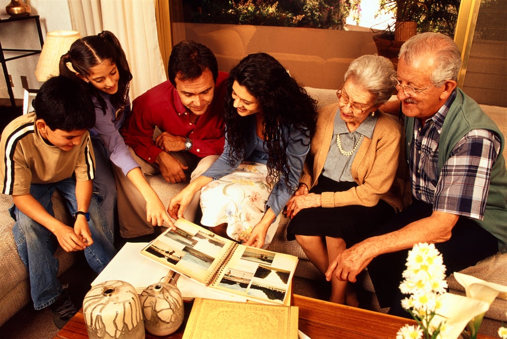 Family looking through photo albums